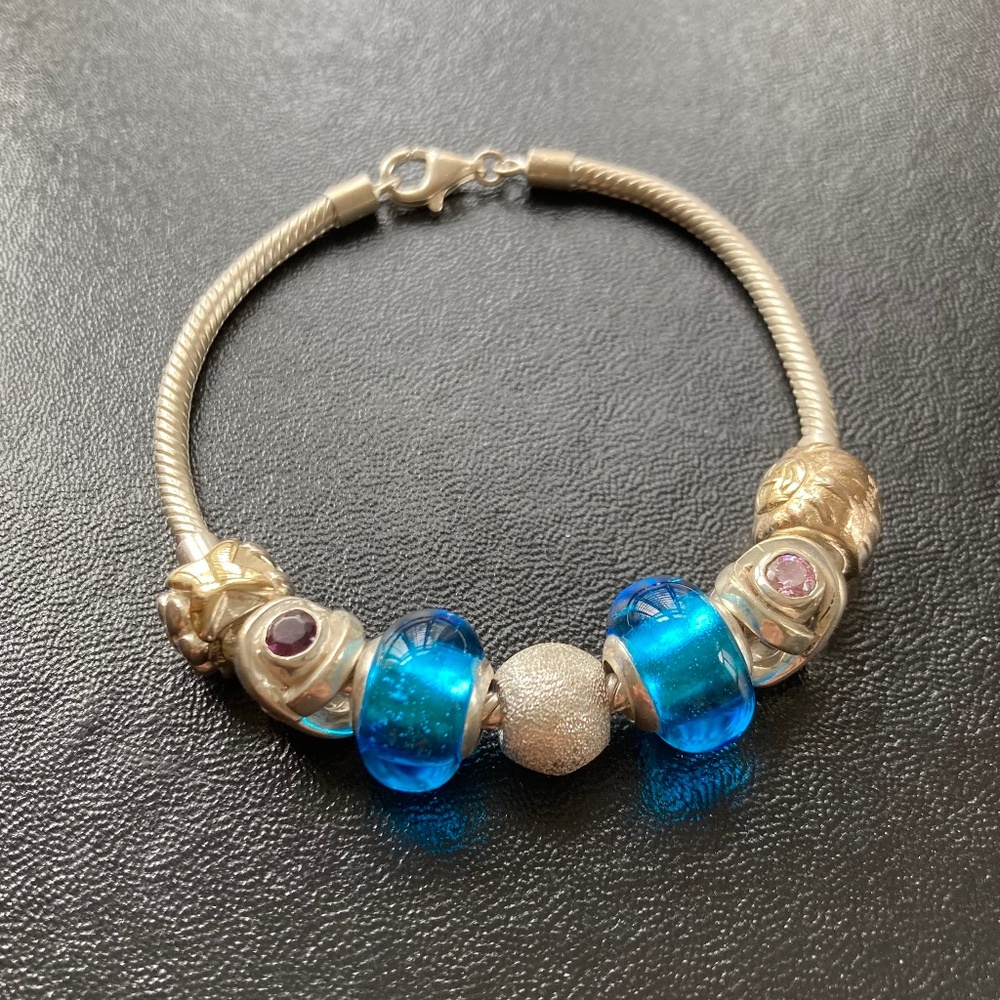 Pandora sterling silver 7 charms bracelet